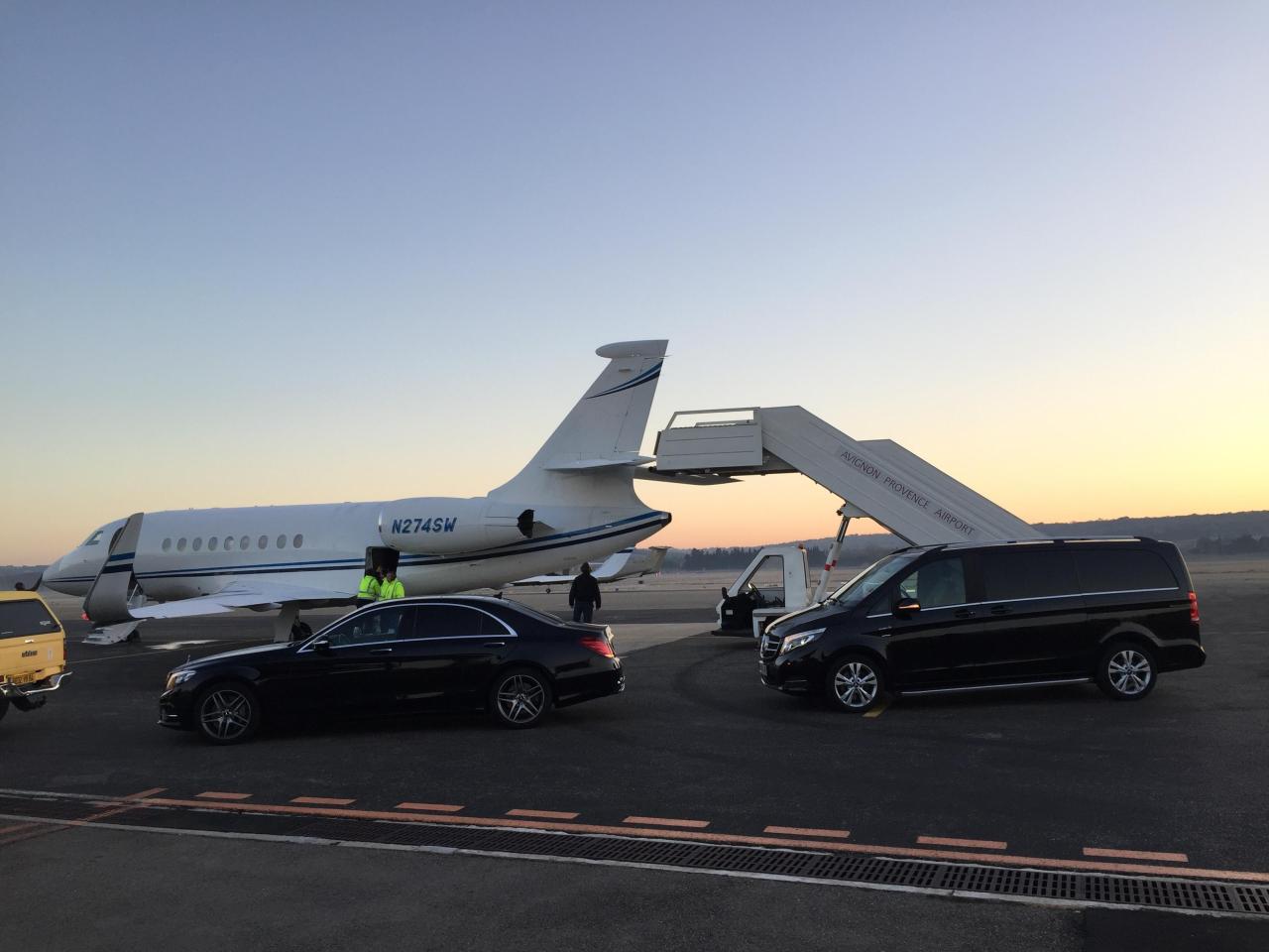 Private transfer service in Chamonix: Mercedes S Class and V Class beside a private jet on the tarmac