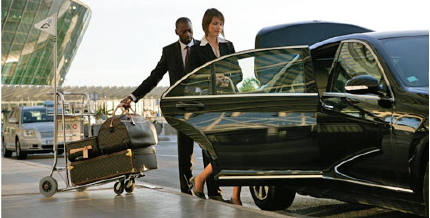 Private chauffeur in Chamonix welcoming a client at the airport